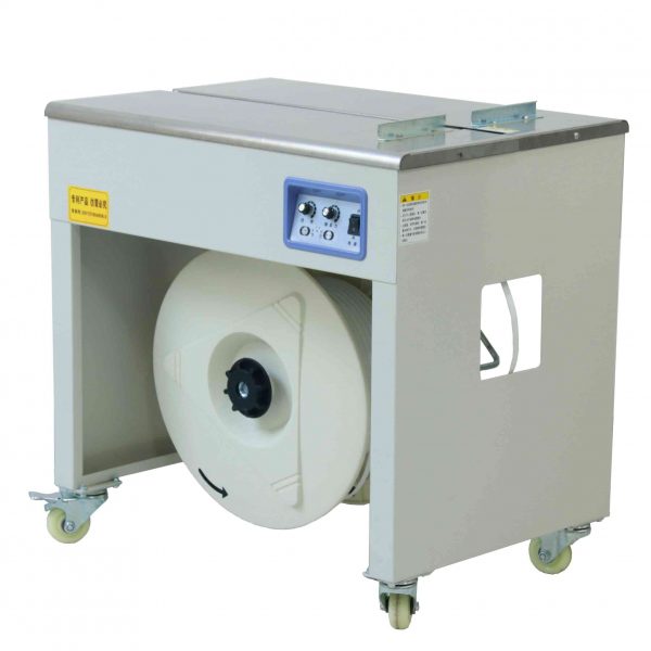 "Semi-automatic strapping machine in operation, quickly completing packaging tasks for logistics and e-commerce scenarios." "Efficient packaging equipment – semi-automatic strapping machine compatible with various strapping bands to enhance packaging efficiency." "Durable semi-automatic strapping machine used for securing goods during packaging and transportation."