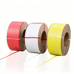 Three rolls of colored plastic strapping tape in red, white, and yellow, each wound on a cardboard core.