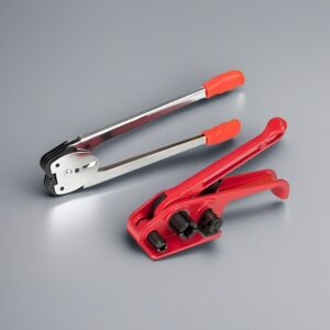 PP PET Strapping Tensioner in use for bundling heavy packages