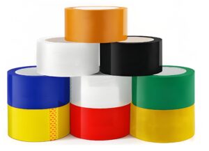 Assorted rolls of colored BOPP packaging tape in orange, white, black, blue, red, green, and yellow