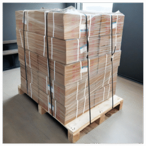 Pallet of cardboard boxes secured with white and black pallet straps and wrapped in stretch film for shipping.